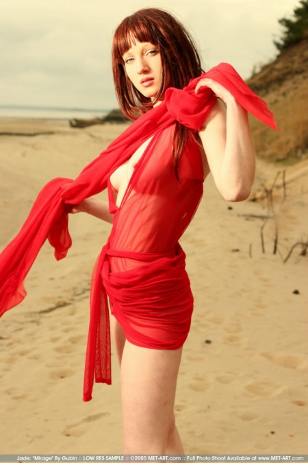 The girl in the red  on the coast
